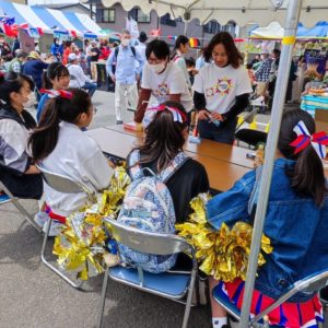 Children playing cards during festival